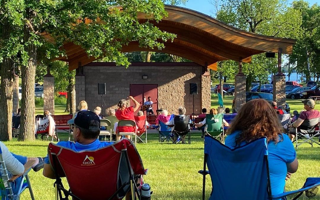 Summer evening concert in the park down by the lake. #detroitlakes #summernights…