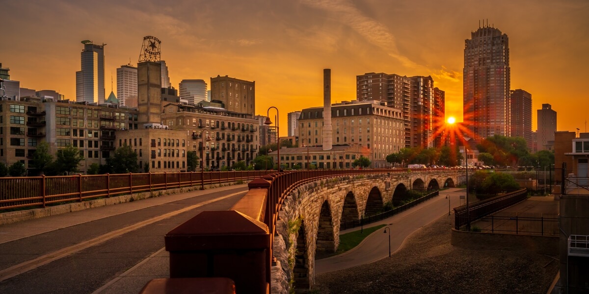 The Old Stone Arch Bridge: Sunset Glow Over Minneapolis Old Stone Arch Bridge